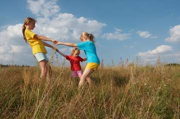 Wall Mural - Children on a meadow