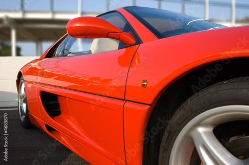 Fotografia Side of bright red sports car