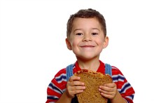 Boy With Peanut Butter Sandwich On Whole Wheat Bread