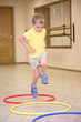 © Pavel Losevsky - boy makes exercise with hoops