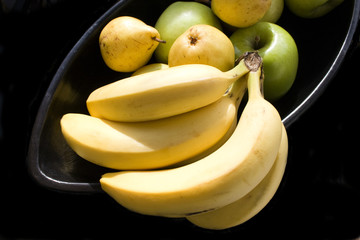 Fruits in black Japanese vase with black background 2