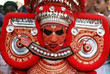 Face art of Vasoorimala Bhagavathi Theyyam perfoming the festival time, Kannur, Kerala, South India	