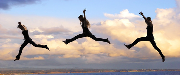 leaping woman at sunset