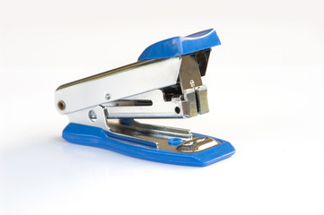 Blue stapler on white background 