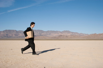 Canvas Print - Businessman with a box