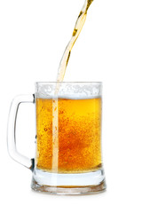 Pouring beer into mug isolated over a white background