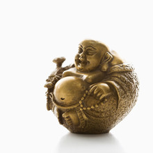 Happy Laughing Buddha Brass Figurine On White Background.