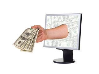 Hand with money and computer monitor