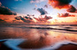Leinwanddruck Bild - sunset and waves