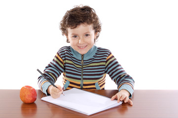 Poster - adorable boy studying a over white background