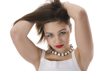 Portrait of the young beautiful girl on insulated background..