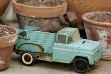 Vintage Toy Truck In The Garden