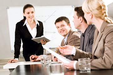 Wall Mural - Portrait of business people discussing a new strategy 