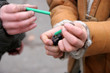 two boys handle petard with lighter