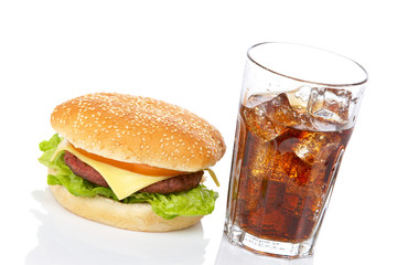 Canvas Print - Cheeseburger and soda, on white background. Shallow DOF