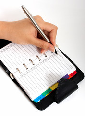 Poster - writing on an organizer