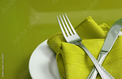 Fotografie, Obraz An elegant holiday table setting with fork, knife and napkin