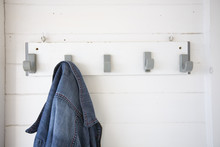 Clothes Rack With A Jeans Jacket In A Beach Cabin