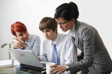 beautiful caucasian business women with young consultant