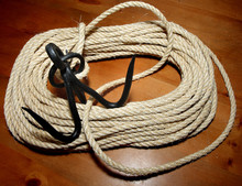 Grappling Hook Attached To A Coil Of Sisal Rope