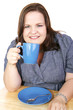 © Lisa F. Young - Pretty plus-sized businesswoman on a coffee break.