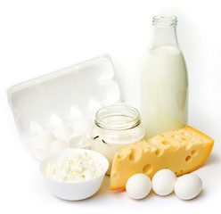 Fresh eggs and dairy products in glass containers