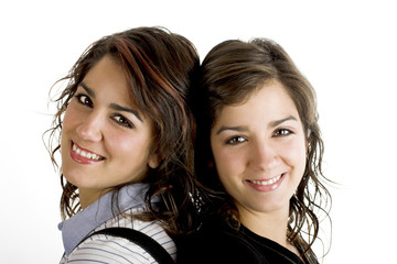 portrait of two young and beautiful sisters