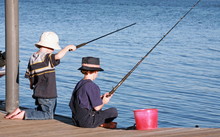 Boys Fishing Off The Pier