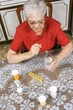 Senior woman taking pill