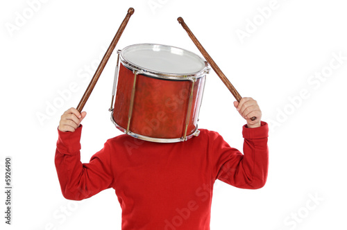 Fotografía Child with a drum in the head a over white background