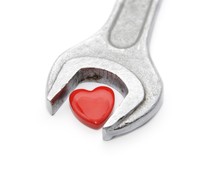 Wrench For Heart. On A White Background