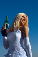 Blonde bride whit wine bottle