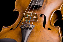 Old Violin Close-up Isolated On Black Background