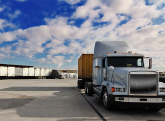 Heavy goods truck leaving loading bay