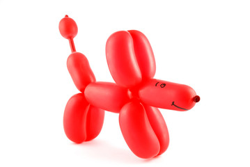 High resolution red twisted balloon dog isolated on white