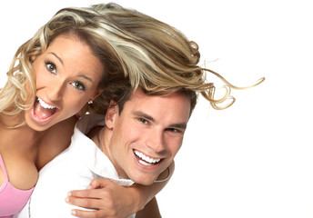 Wall Mural - young love couple smiling. over white background .