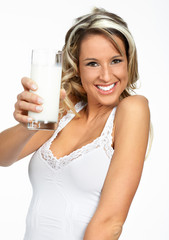 Sticker - Young happy woman  drinking milk. Over white background  .