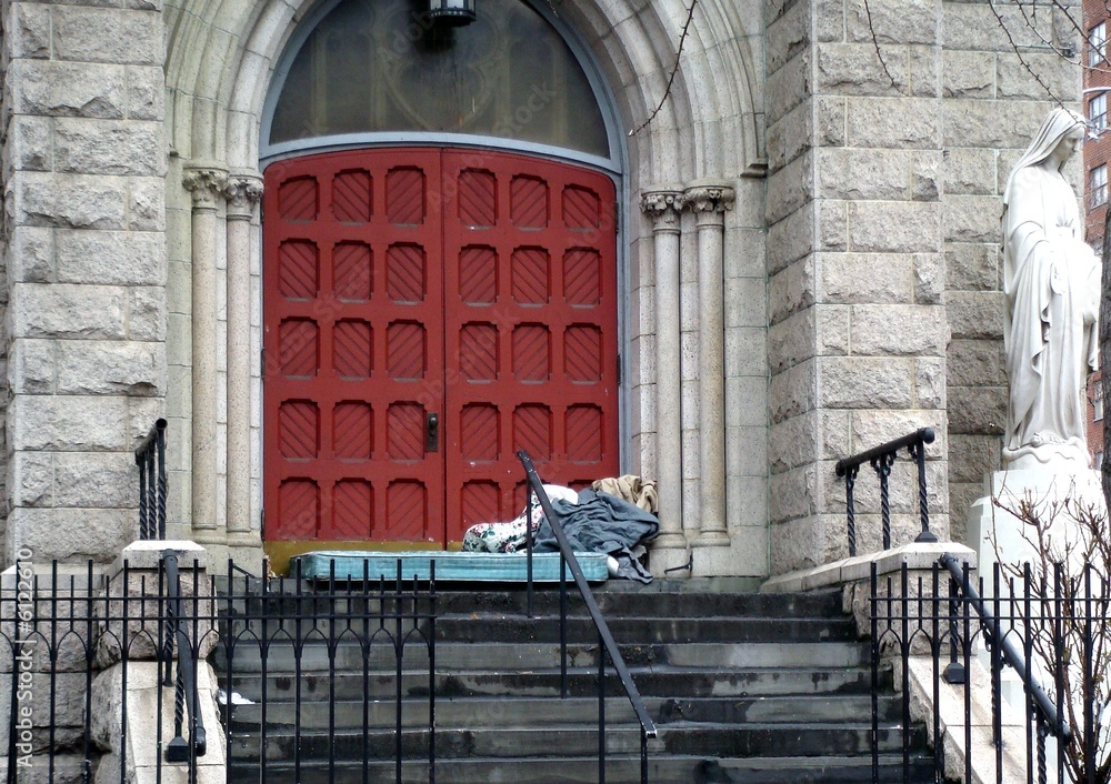 sleeping by the church door