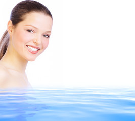 Poster - Pretty young woman in clean blue water.