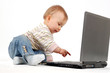 © Adam Borkowski - baby having fun with laptop