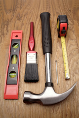 Tools on wooden panel