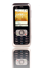 Wall Mural - black cell phone standing on white background and ringing