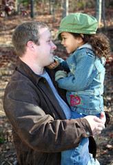 Wall Mural - Father with Daughter outside with jackets in winter