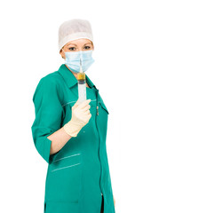 nurse with filled syringe in her hands