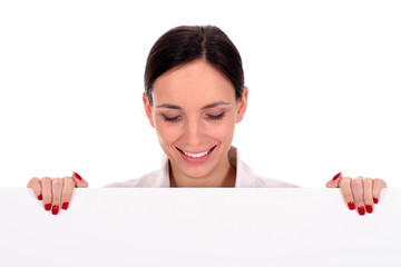 Woman holding blank poster