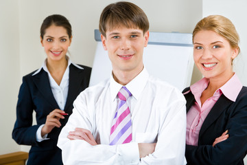 Poster - Portrait of businesspeople looking at camera with smiles