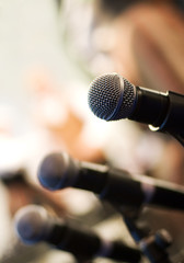 Microphone on abstract blurred background (shallow DoF)