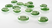 Green Glass Pebbles With Reflection