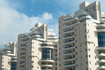 modern building on a background of the sky with clouds