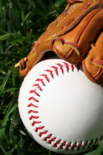 A Baseball Glove With A Baseball